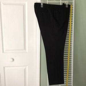 Black pants. Hit below ankle for 5’5